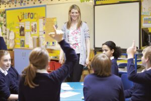 students asking past paper english questions to the teacher